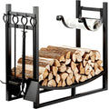 Black firewood rack with stacked logs and 4 fireplace tools