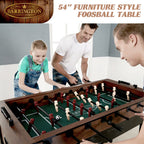 Father and daughter playing foosball together