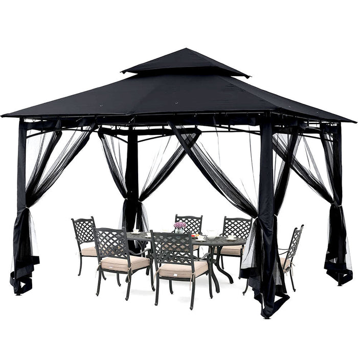 Black steel patio gazebo with mesh netting over an outdoor dining set