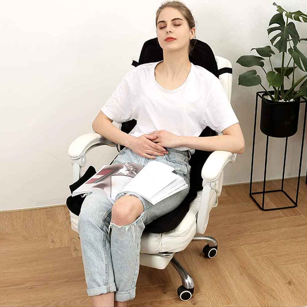Heated massage chair pad on an office chair