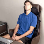 Heated massage chair pad fitted on a car seat