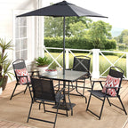 Black patio dining set with umbrella on a porch