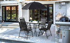 Black dining set on a modern outdoor terrace