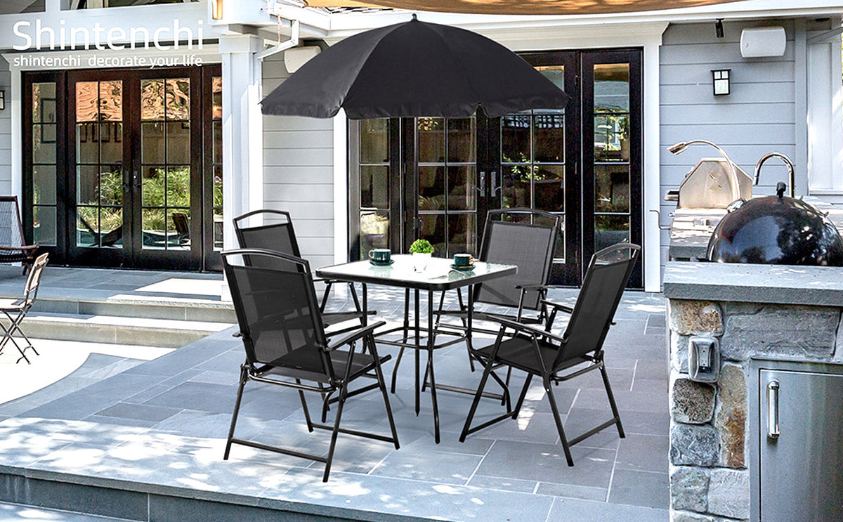 Black dining set on a modern outdoor terrace