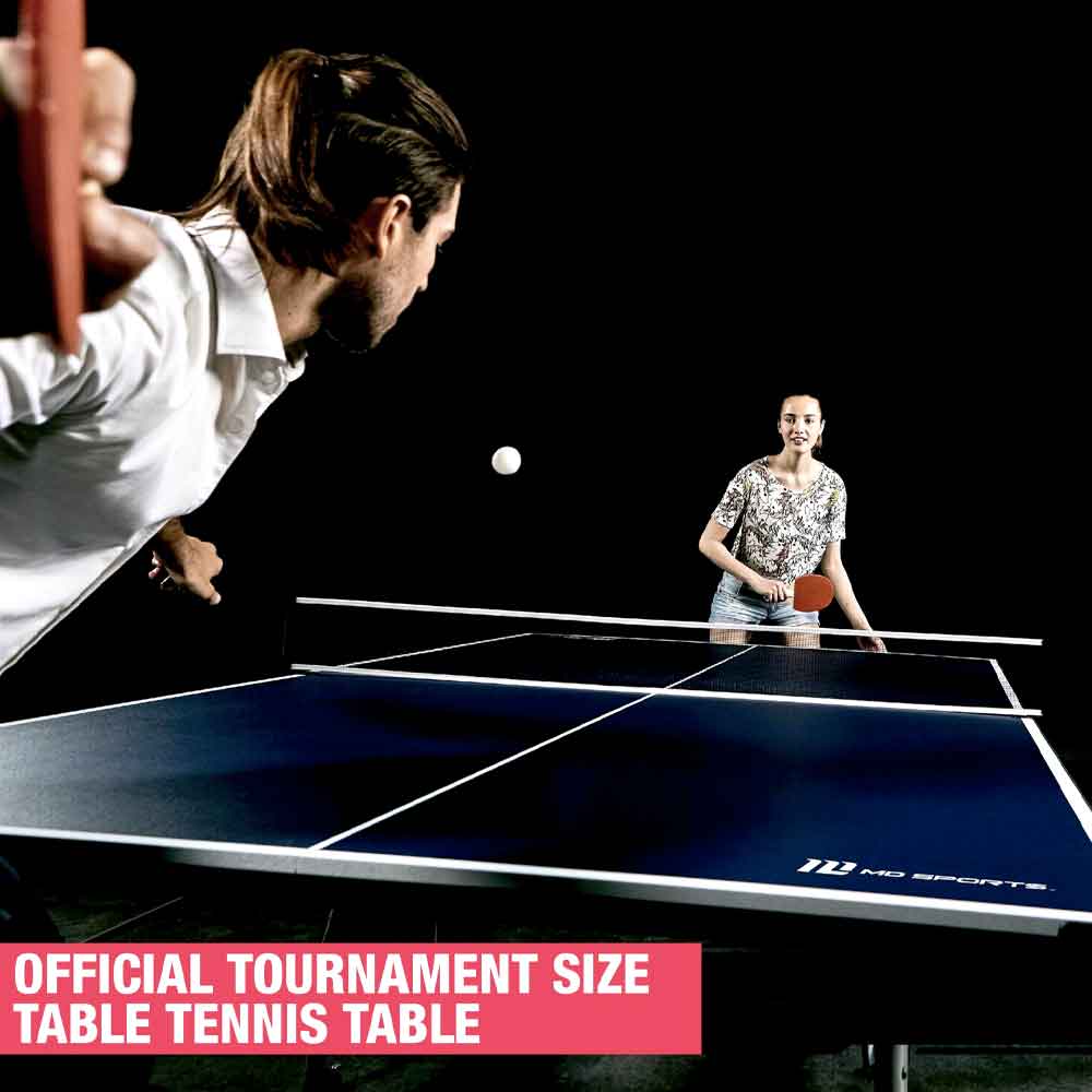 Two players in a fast rally at the table tennis table