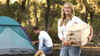 Portable flush toilet set up at an RV campsite