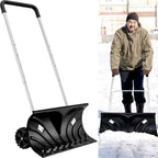 Snow pusher in use clearing snow, with a man holding it upright