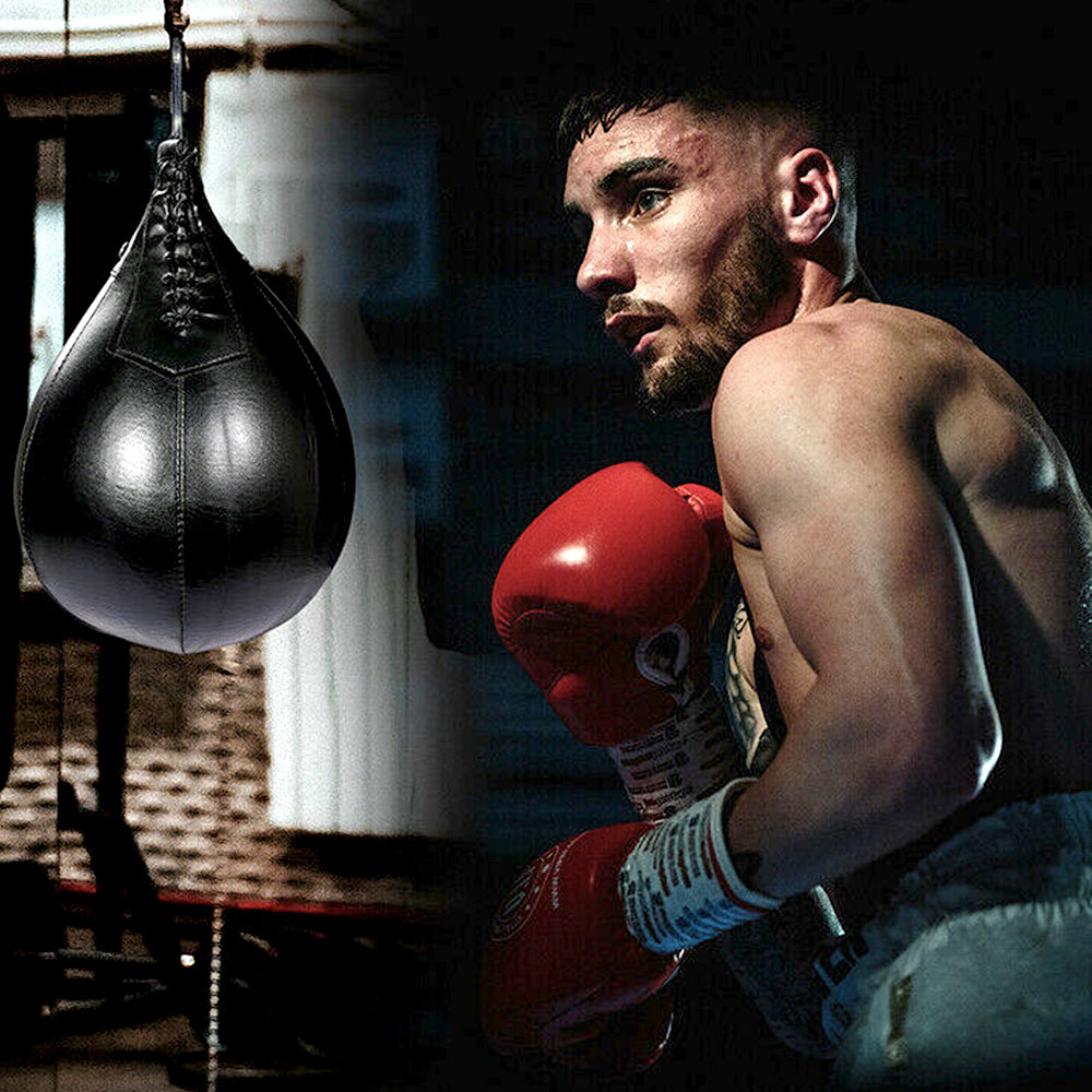 Boxer in red gloves beside the black speed bag