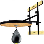 Wall-mounted speed bag platform with a black leather speed bag