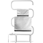 White freestanding heated towel warmer rack with towels