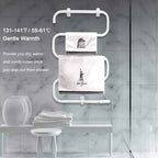 Wall-mounted towel warmer heating to 131–141°F