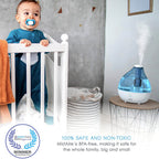 Cool mist humidifier near a baby's crib in a nursery