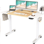 White standing desk with dual monitors, side hooks and caster wheels