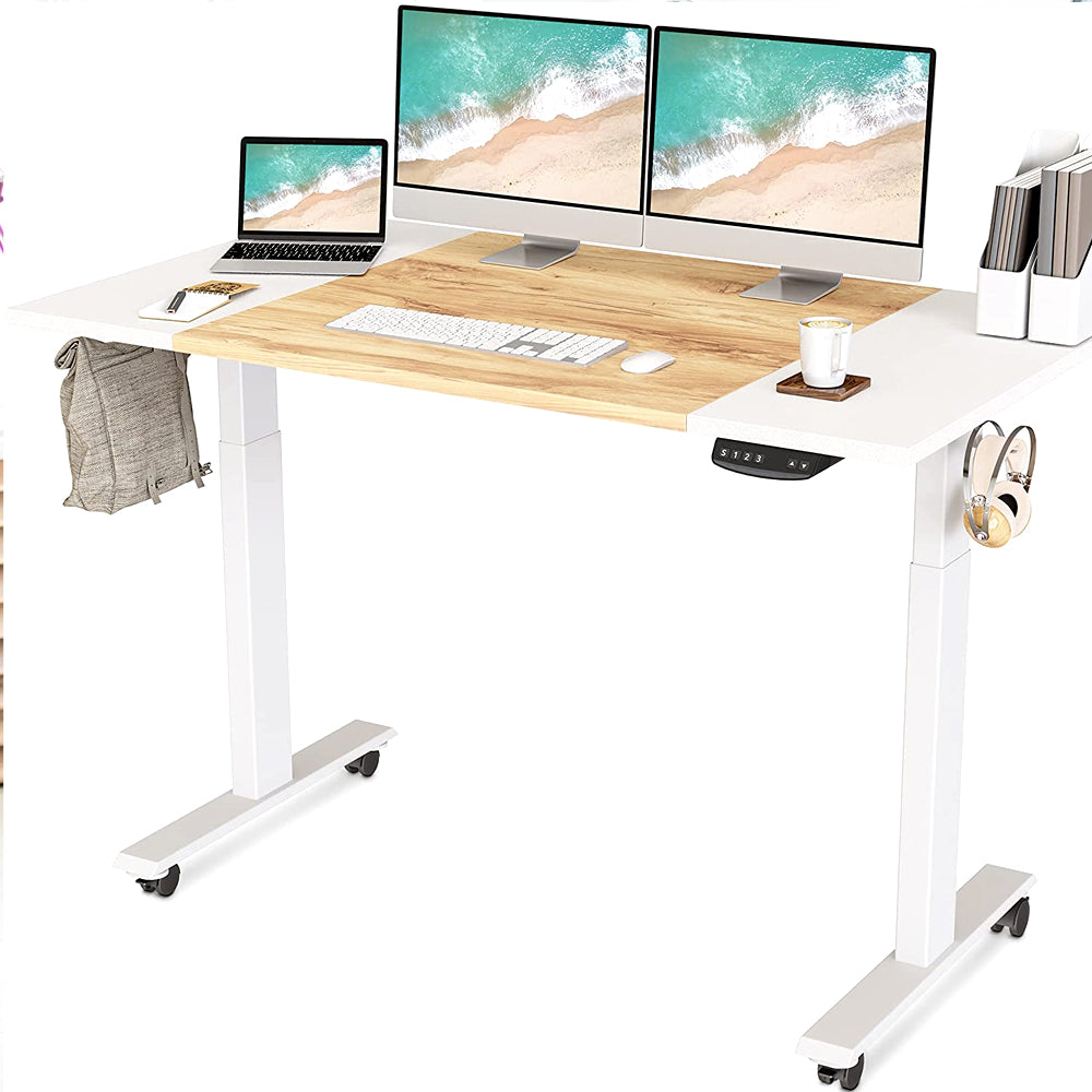 White standing desk with dual monitors, side hooks and caster wheels
