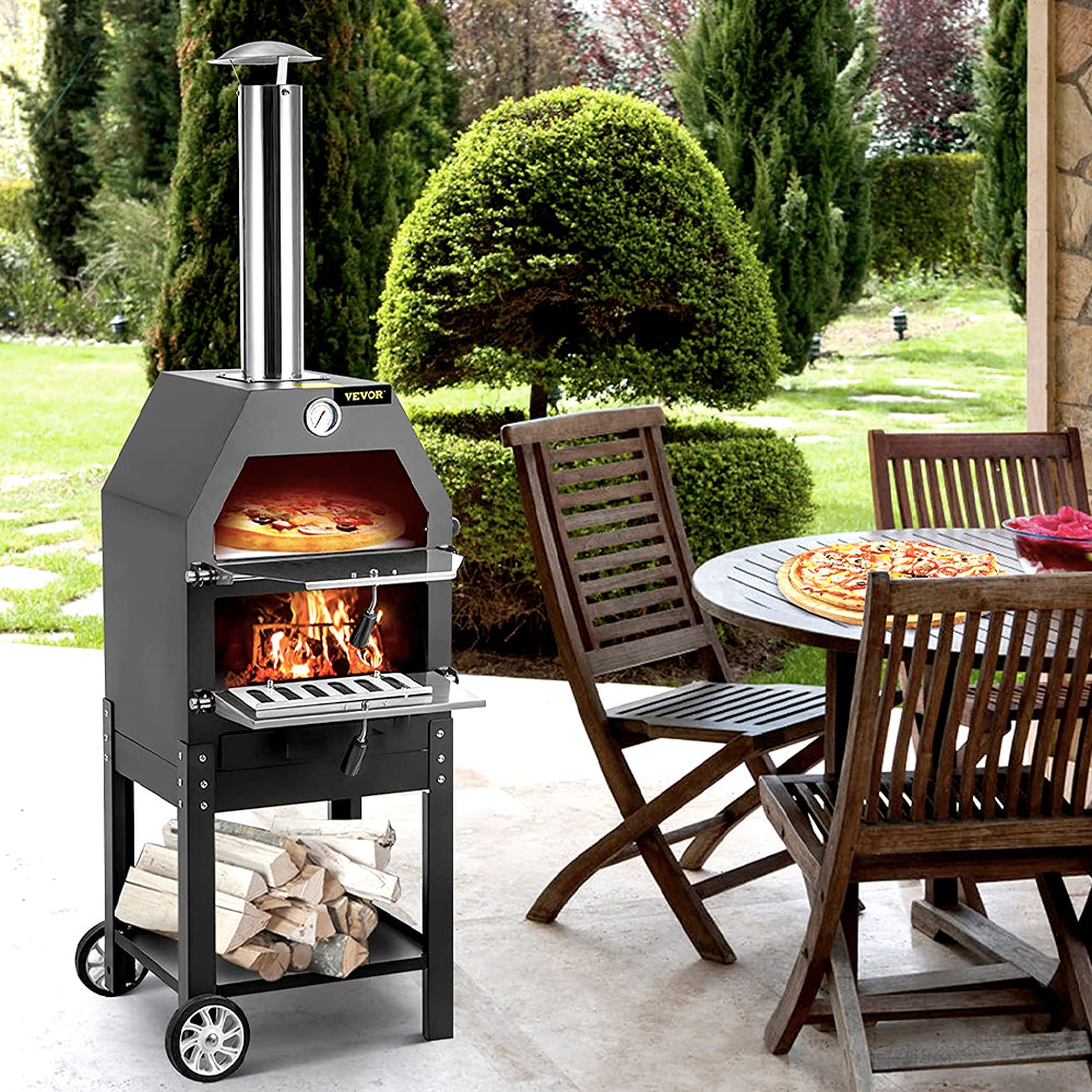 Pizza oven baking beside a patio dining table