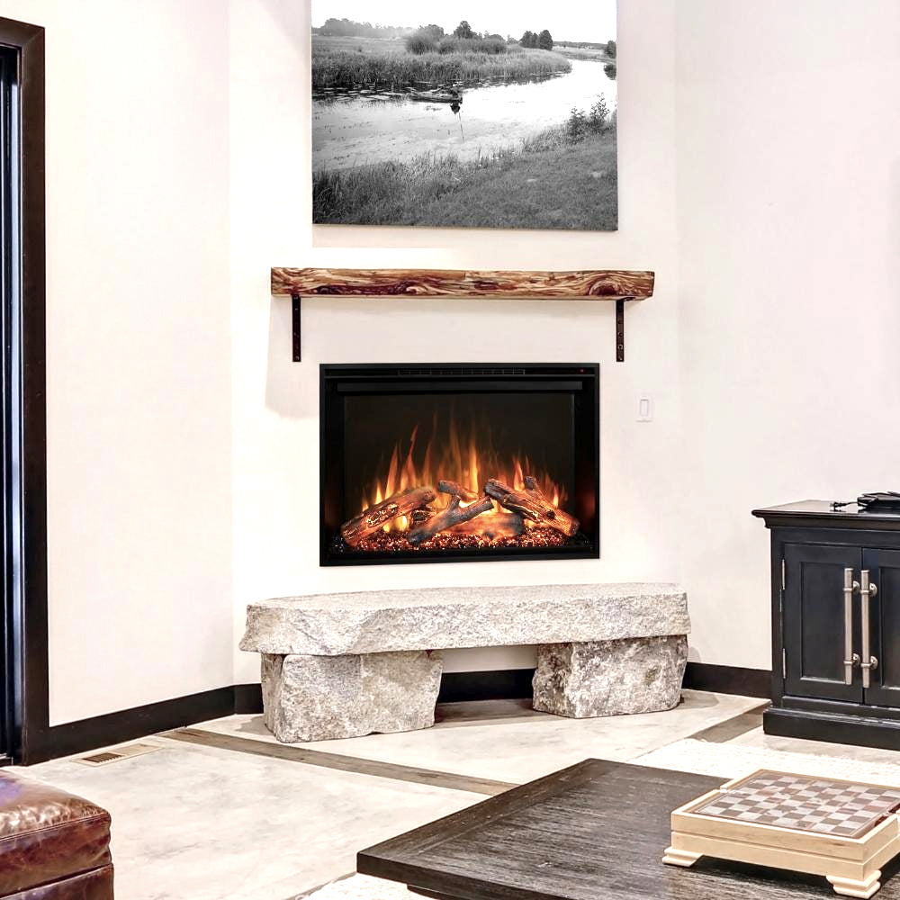 Electric fireplace insert below a rustic wood shelf in a living room